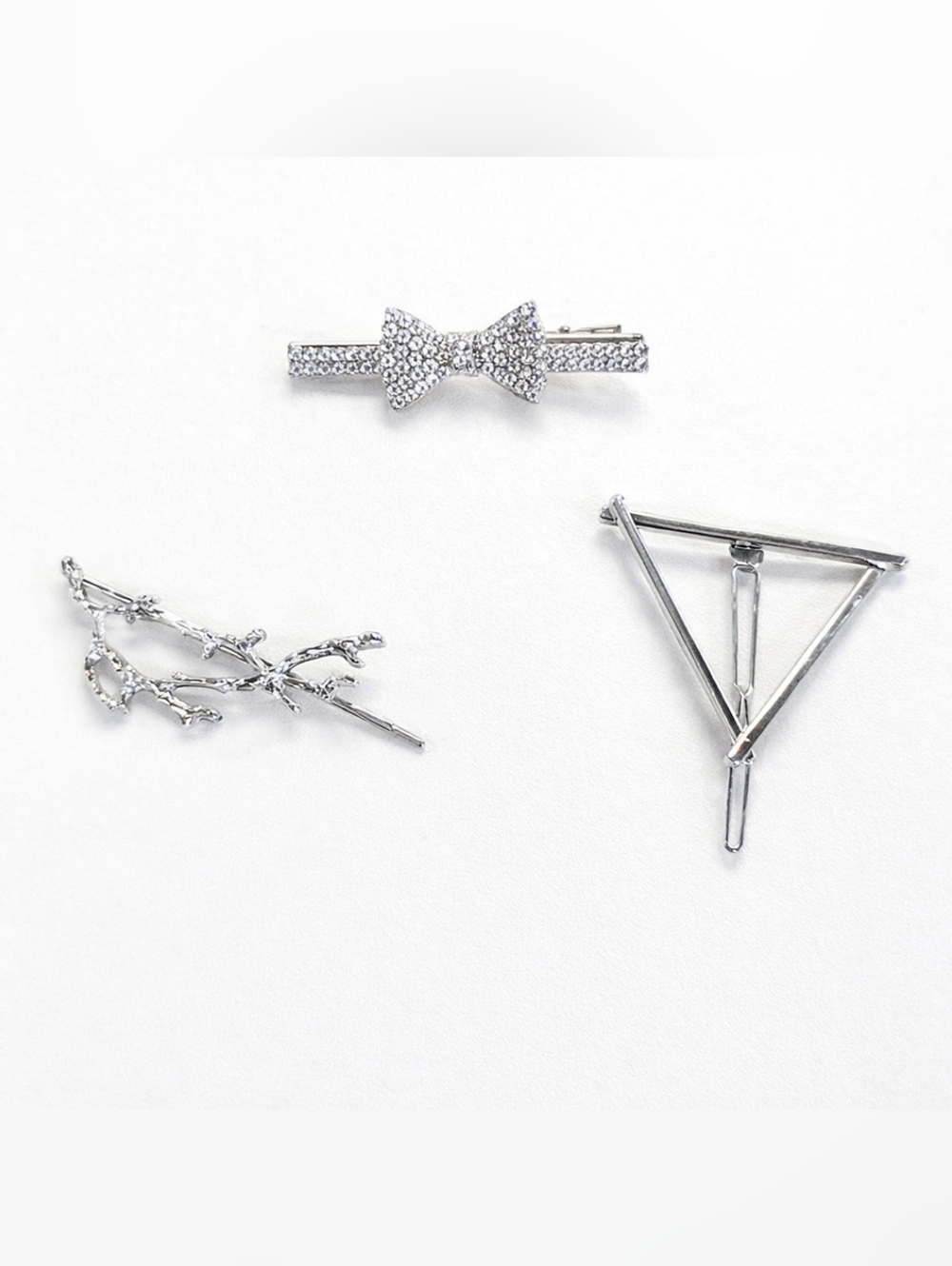 VINTAGE SILVER HAIR CLIPS.